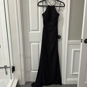 Never worn. Black with purple sparkle prom dress. Perfect condition